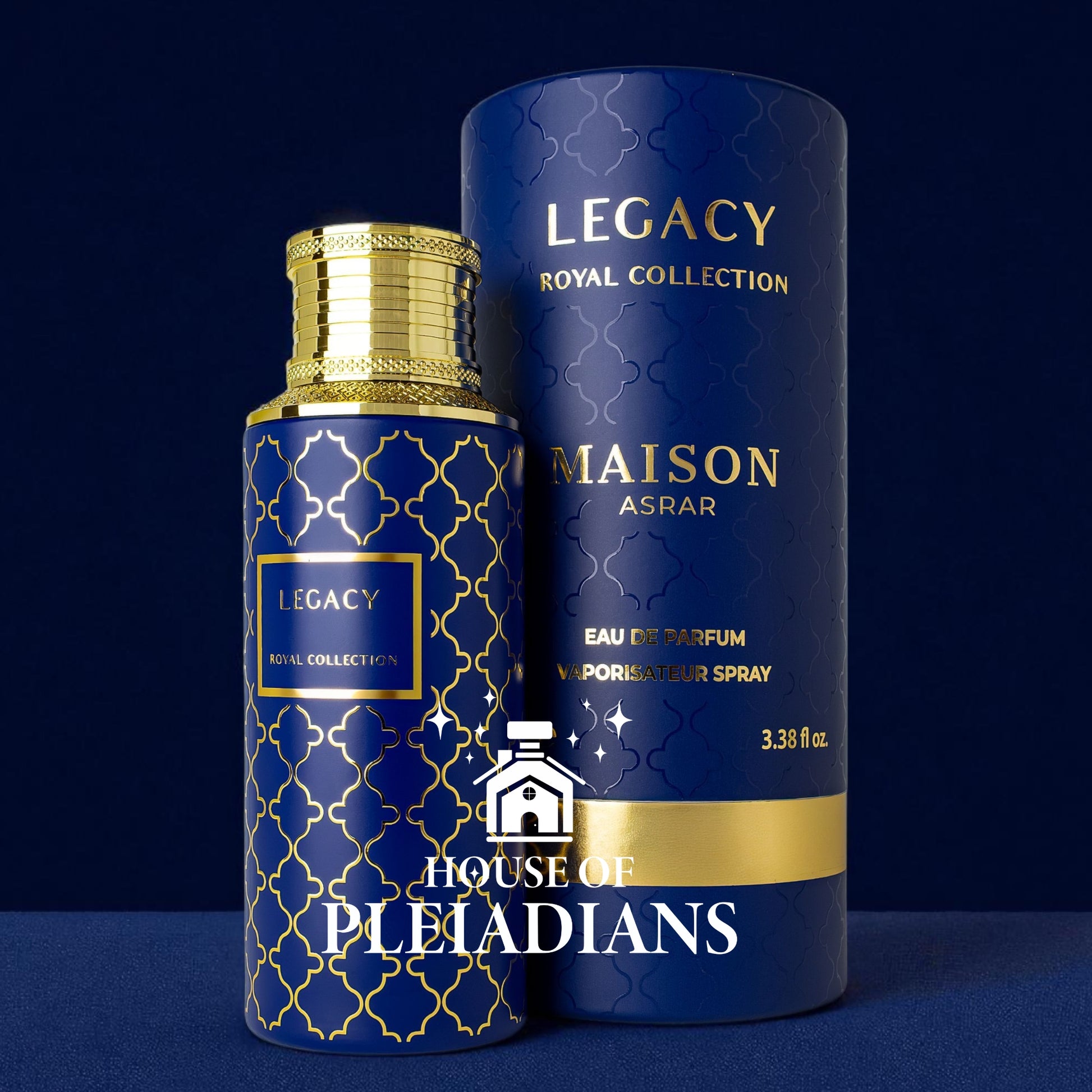 Legacy 100 ml by Maison Asrar – deep blue cylindrical bottle and matching tube, featuring geometric gold latticework and gold cap; a refined modern-fruity scent with sparkling ginger, pear, and bergamot top notes, followed by a white-floral and woody heart, settling on a creamy vanilla, musk, and ambery base.