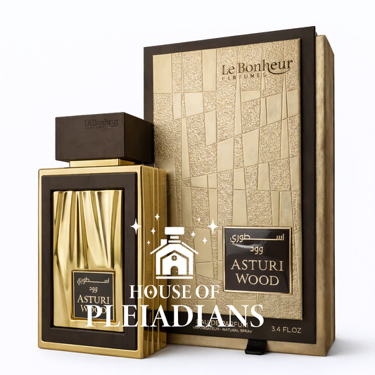 Gold perfume bottle and packaging with 'Le Bonheur' branding on a white background