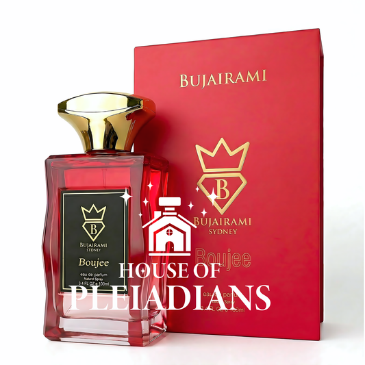 Red perfume bottle with gold cap and matching box labeled 'Bujairami' on a white background